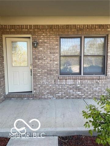 1128 Brookside Ct, Avon, IN 46123 - doorway to property featuring brick siding