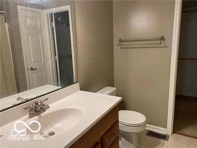1128 Brookside Ct, Avon, IN 46123 - bathroom with vanity and tile patterned flooring