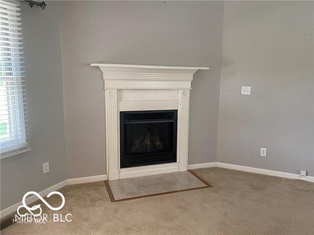 1128 Brookside Ct, Avon, IN 46123 - detailed view of carpet and a fireplace with flush hearth