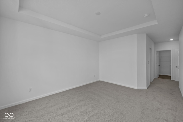 12490 Morning Ridge Way, Noblesville, IN 46060 - carpeted empty room featuring a raised ceiling and recessed lighting
