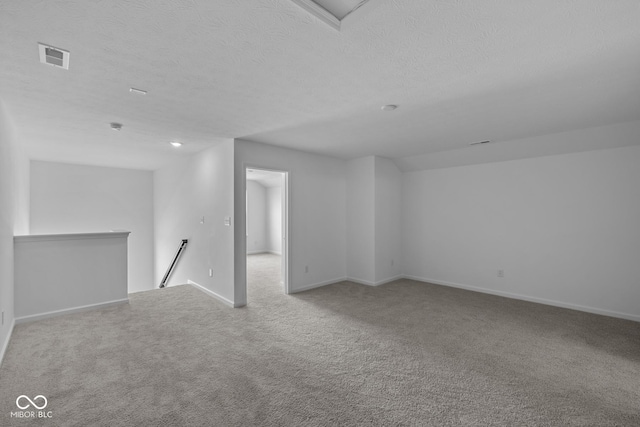 12490 Morning Ridge Way, Noblesville, IN 46060 - unfurnished living room with carpet flooring and a textured ceiling