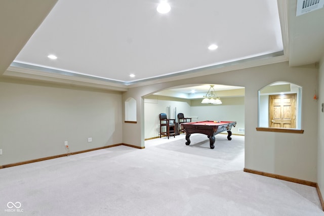 5037 Surrey Ln, Carmel, IN 46033 - recreation room featuring pool table, carpet flooring, a tray ceiling, arched walkways, and ornamental molding