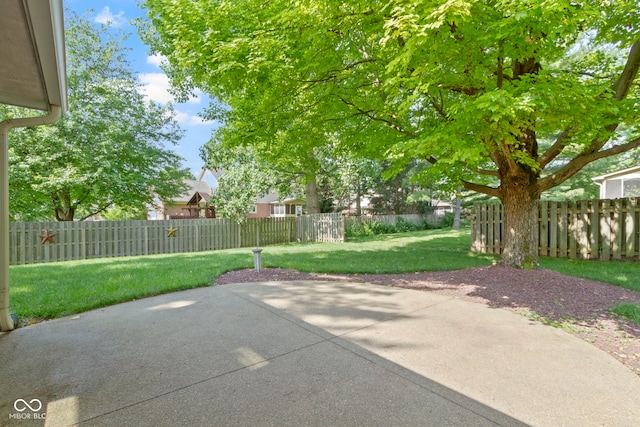 5037 Surrey Ln, Carmel, IN 46033 - fenced backyard with a patio