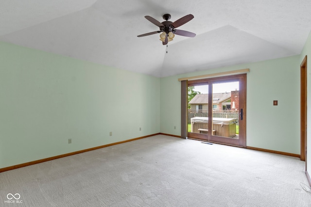 5037 Surrey Ln, Carmel, IN 46033 - carpeted empty room featuring lofted ceiling and a ceiling fan