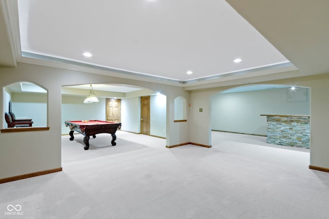 5037 Surrey Ln, Carmel, IN 46033 - recreation room featuring a raised ceiling, arched walkways, carpet floors, pool table, and crown molding