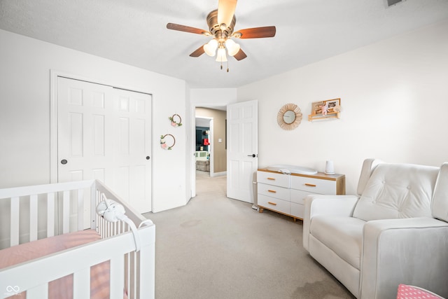 7833 Meadow Bend Dr, Indianapolis, IN 46259 - bedroom with light carpet, a closet, and a ceiling fan