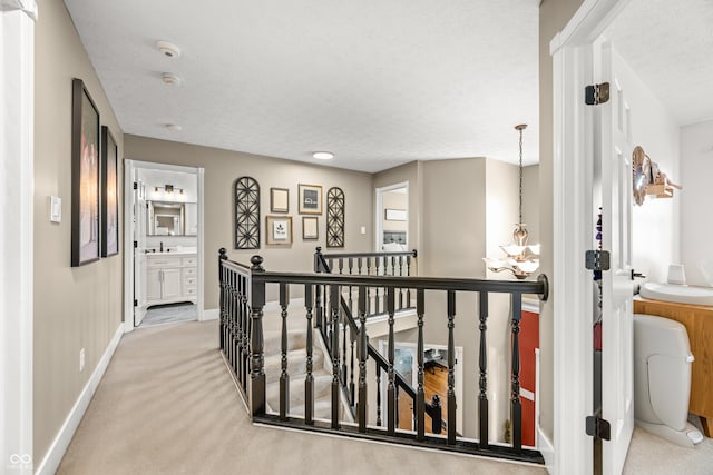 7833 Meadow Bend Dr, Indianapolis, IN 46259 - corridor with an upstairs landing, carpet, and baseboards