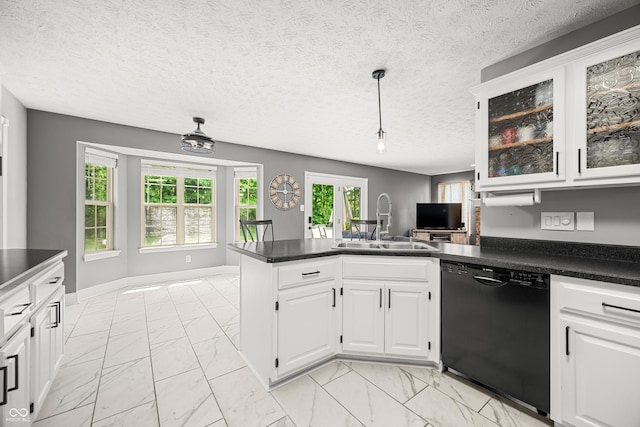 7833 Meadow Bend Dr, Indianapolis, IN 46259 - kitchen with dishwasher, light marble finish floors, a sink, a peninsula, and dark countertops