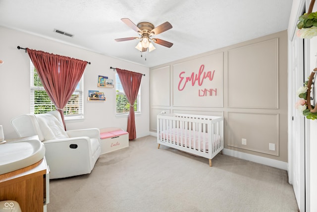 7833 Meadow Bend Dr, Indianapolis, IN 46259 - carpeted bedroom featuring a ceiling fan and a nursery area