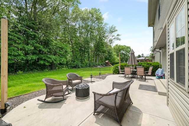 7833 Meadow Bend Dr, Indianapolis, IN 46259 - view of patio / terrace featuring a playground, outdoor dining area, and view of wooded area