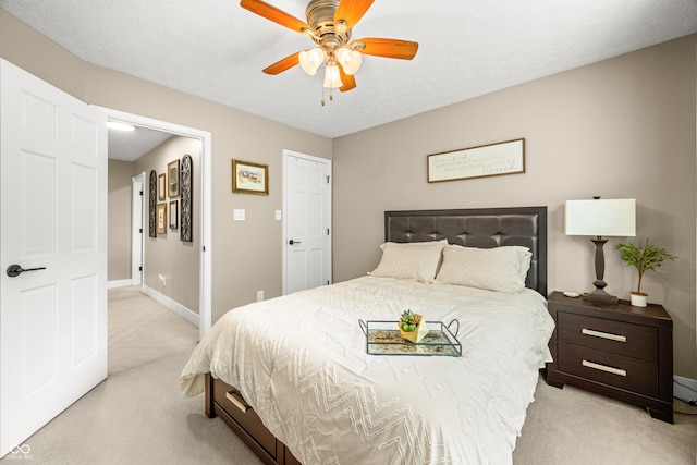 7833 Meadow Bend Dr, Indianapolis, IN 46259 - bedroom with light carpet, baseboards, and ceiling fan