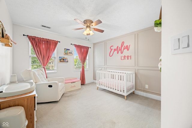 7833 Meadow Bend Dr, Indianapolis, IN 46259 - carpeted bedroom with a nursery area and ceiling fan