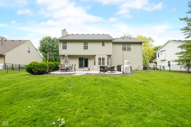 7833 Meadow Bend Dr, Indianapolis, IN 46259 - rear view of house with a patio area and a chimney