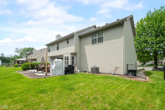 7833 Meadow Bend Dr, Indianapolis, IN 46259 - rear view of house featuring a patio area, a chimney, and central AC unit