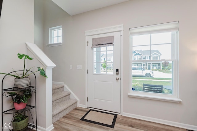3643 Thomas Jefferson St, Westfield, IN 46074 - entrance foyer with light wood-style floors and stairway