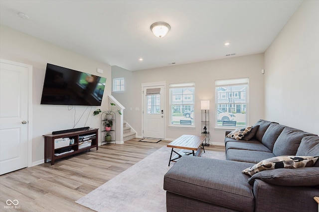 3643 Thomas Jefferson St, Westfield, IN 46074 - living room with light wood finished floors, stairs, and recessed lighting