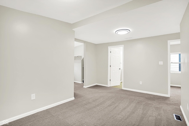 1338 N Parker Ave, Indianapolis, IN 46201 - carpeted empty room featuring baseboards