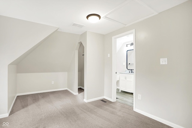 1338 N Parker Ave, Indianapolis, IN 46201 - additional living space with carpet flooring, baseboards, and a sink