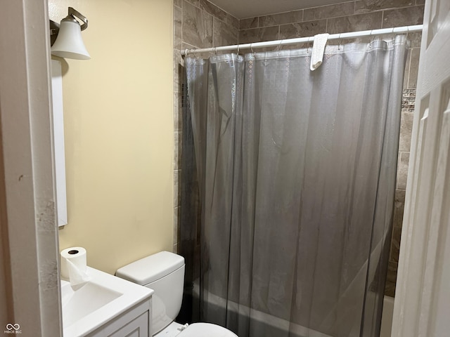 bathroom featuring shower / tub combo with curtain and vanity