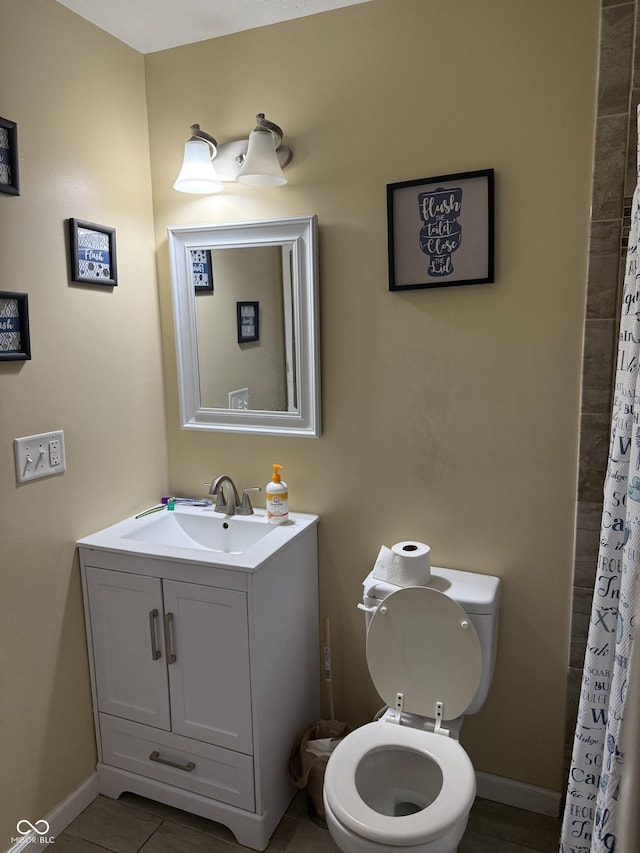 bathroom featuring vanity, curtained shower, and tile patterned floors