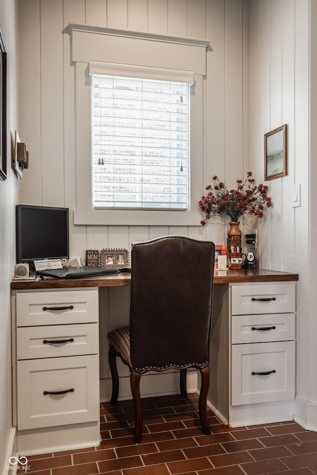 10974 Harbor Bay Dr, Fishers, IN 46040 - home office featuring brick flooring and built in desk