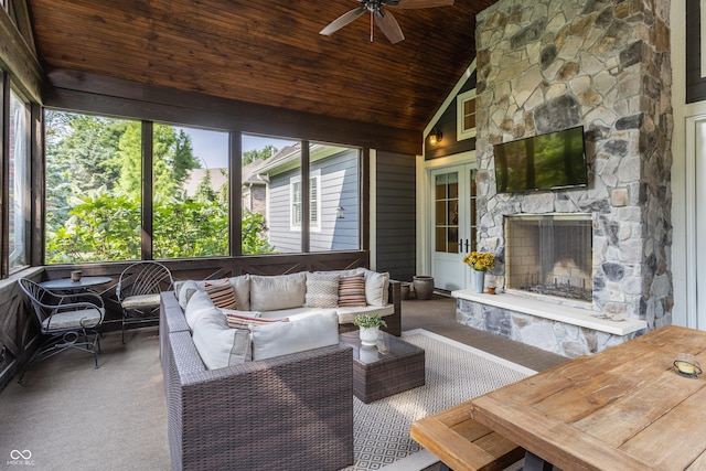 10974 Harbor Bay Dr, Fishers, IN 46040 - sunroom featuring a ceiling fan, lofted ceiling, and an outdoor living space with a fireplace