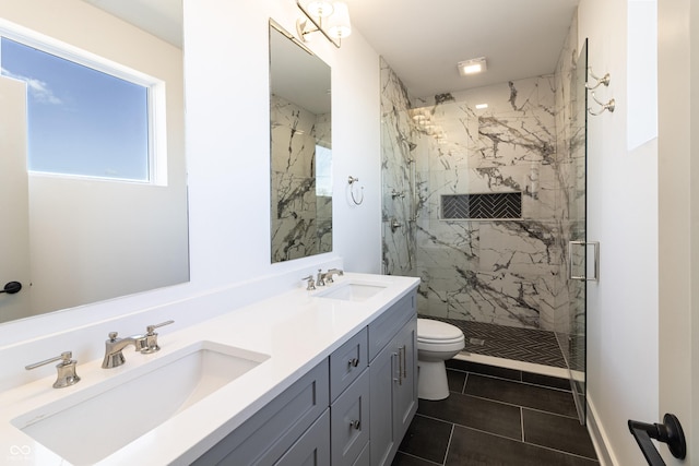 2051-2053 Columbia Ave, Indianapolis, IN 46202 - bathroom with toilet, a marble finish shower, double vanity, and tile patterned floors