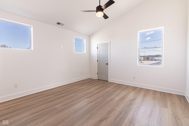 2051-2053 Columbia Ave, Indianapolis, IN 46202 - unfurnished room featuring ceiling fan, light wood-style floors, baseboards, and high vaulted ceiling