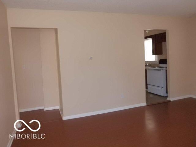 2250 N Goodlet Ave, Indianapolis, IN 46222 - spare room featuring baseboards