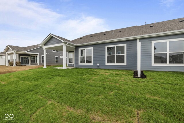 12500 Morning Ridge Way, Noblesville, IN 46060 - back of property with a lawn and roof with shingles