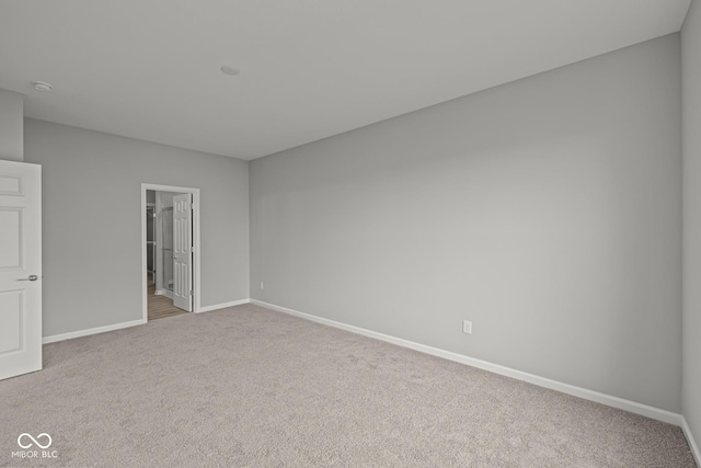 12500 Morning Ridge Way, Noblesville, IN 46060 - unfurnished bedroom with carpet floors, baseboards, and ensuite bath