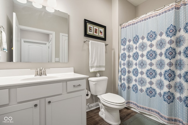 8842 Twain Ln, Indianapolis, IN 46239 - bathroom with vanity, wood finished floors, and a shower with shower curtain