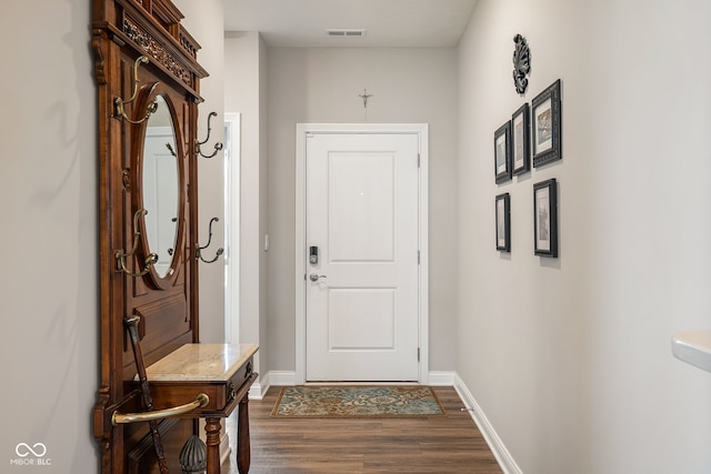 8842 Twain Ln, Indianapolis, IN 46239 - entryway with dark wood-type flooring