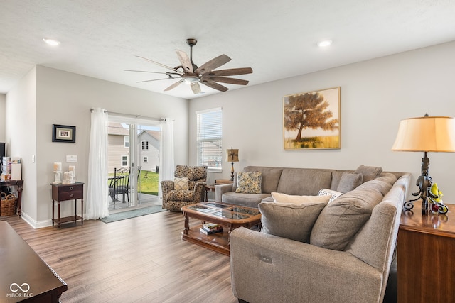 8842 Twain Ln, Indianapolis, IN 46239 - living area with a ceiling fan, wood finished floors, and recessed lighting