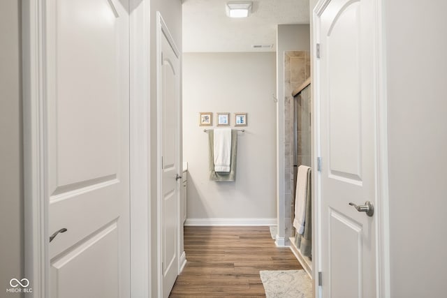 8842 Twain Ln, Indianapolis, IN 46239 - full bath featuring a shower stall and wood finished floors