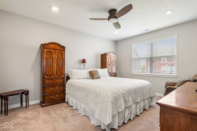 8842 Twain Ln, Indianapolis, IN 46239 - bedroom featuring light carpet, ceiling fan, and recessed lighting