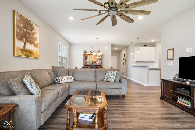 8842 Twain Ln, Indianapolis, IN 46239 - living room with dark wood-style flooring, a ceiling fan, a chandelier, and recessed lighting