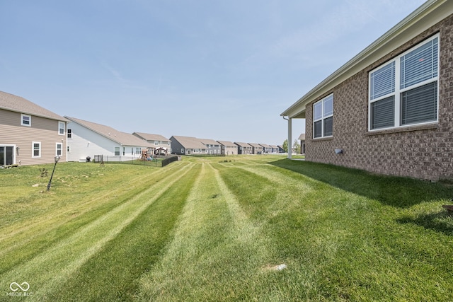 8842 Twain Ln, Indianapolis, IN 46239 - view of grassy yard featuring a residential view
