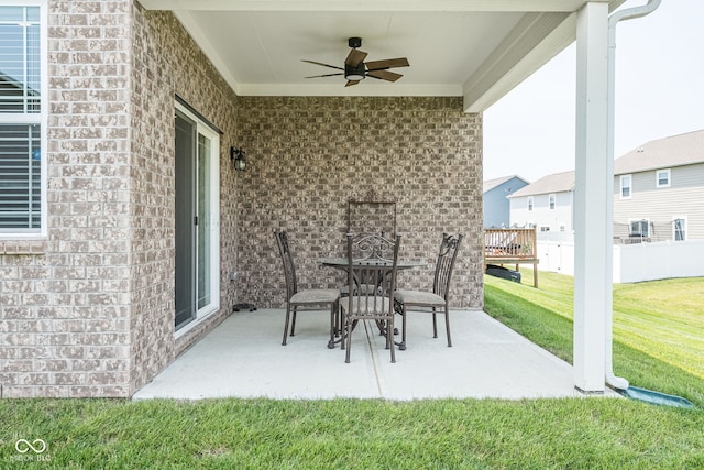 8842 Twain Ln, Indianapolis, IN 46239 - view of patio with a ceiling fan and outdoor dining space