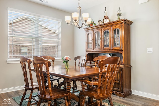 8842 Twain Ln, Indianapolis, IN 46239 - dining room with a chandelier and wood finished floors