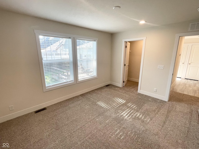 1628 Spann Ave, Indianapolis, IN 46203 - carpeted spare room with baseboards