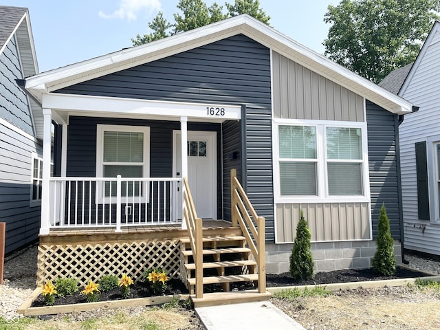 1628 Spann Ave, Indianapolis, IN 46203 - view of front facade featuring a porch