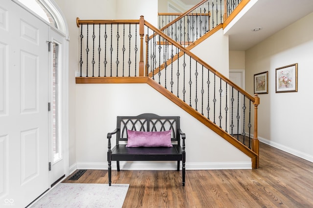 47 Torrey Pine Dr, Brownsburg, IN 46112 - entrance foyer with wood finished floors, stairway, and a high ceiling