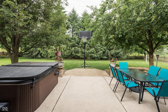 47 Torrey Pine Dr, Brownsburg, IN 46112 - fenced backyard with a hot tub, outdoor dining space, and a patio