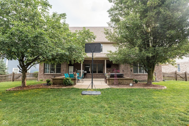 47 Torrey Pine Dr, Brownsburg, IN 46112 - rear view of house with brick siding, a patio area, and a shingled roof