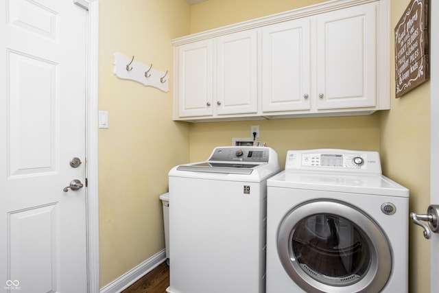 47 Torrey Pine Dr, Brownsburg, IN 46112 - washroom featuring cabinet space, independent washer and dryer, and wood finished floors
