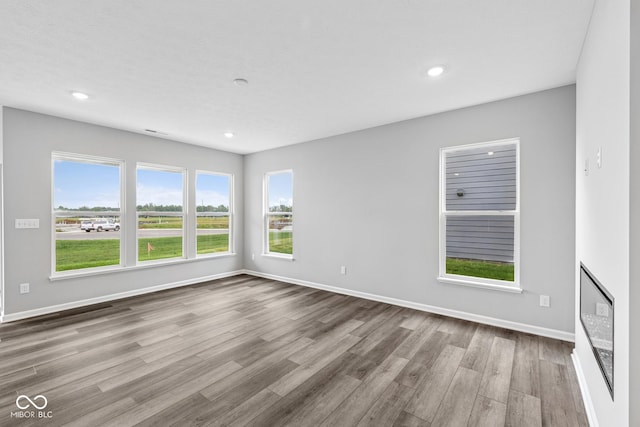 12516 Morning Ridge Way, Noblesville, IN 46060 - unfurnished room with wood finished floors and recessed lighting