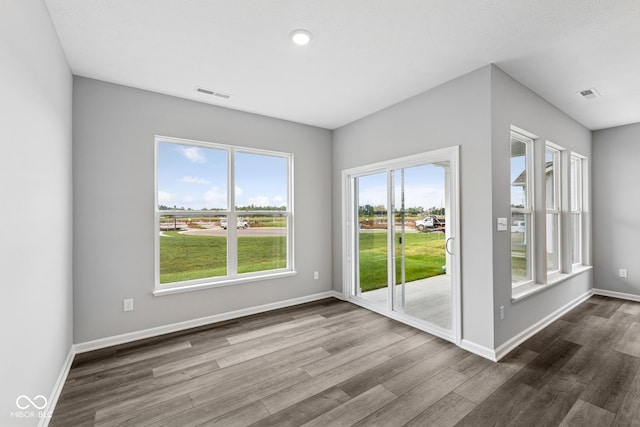 12516 Morning Ridge Way, Noblesville, IN 46060 - spare room with dark wood-type flooring and baseboards