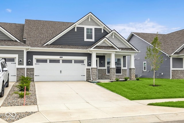 12516 Morning Ridge Way, Noblesville, IN 46060 - craftsman house with stone siding, driveway, a garage, and a front lawn