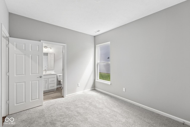 12516 Morning Ridge Way, Noblesville, IN 46060 - unfurnished bedroom with light colored carpet and ensuite bath